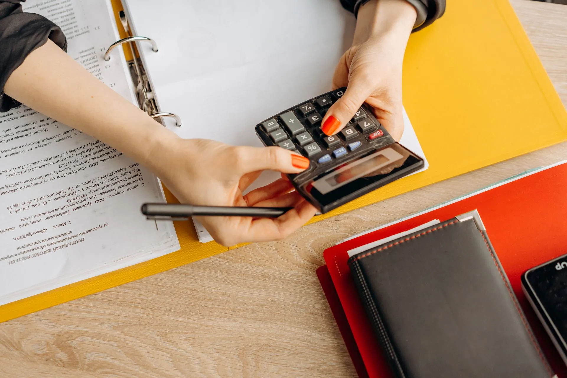 Accounts paperwork and calculator on a desk E P Accountants Shrawley