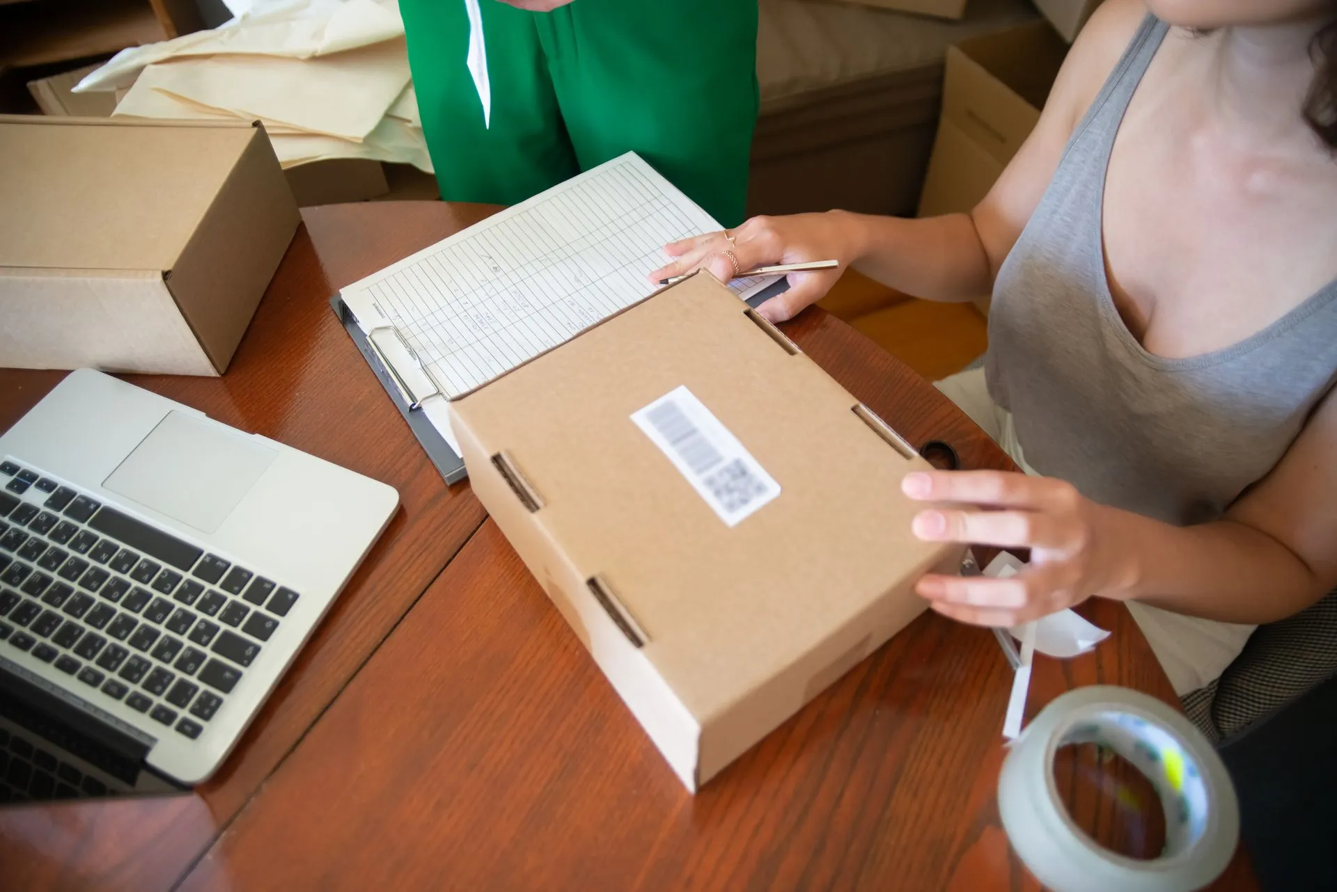 Online seller packing orders for dispatch E P Accountants e-commerce accounting